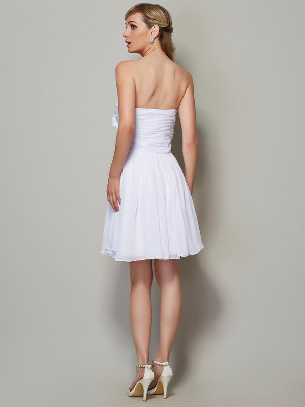 A-Line/Princess Strapless Sleeveless Pleats Applique Short Chiffon Bridesmaid Dresses