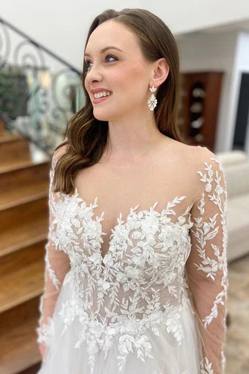 A Line See Through Long Sleeve Lace Appliques Wedding Dresses