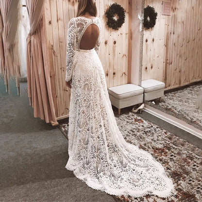 Elegant Mermaid Lace Long Sleeve Boho Scoop Neck Open Back Pearls Modern Wedding Dresses