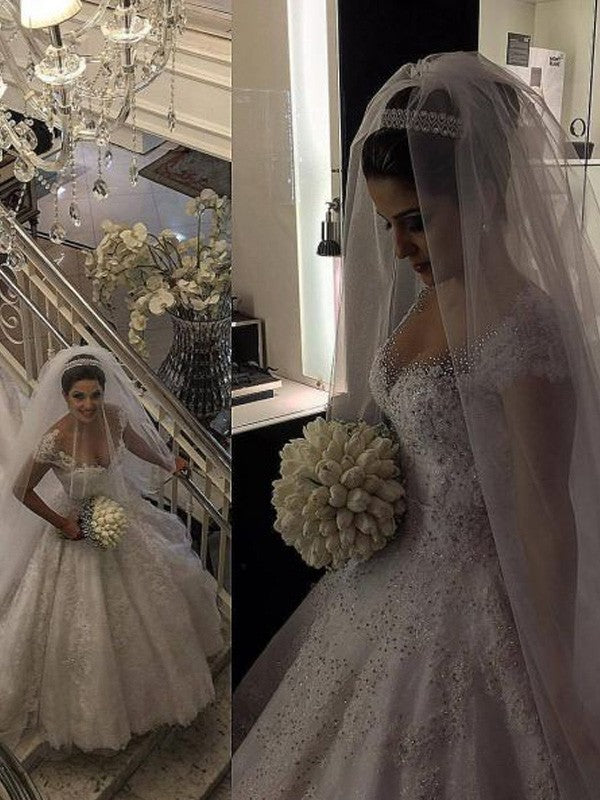 Ball Gown Sleeveless V-neck Beading Floor-Length Tulle Wedding Dresses