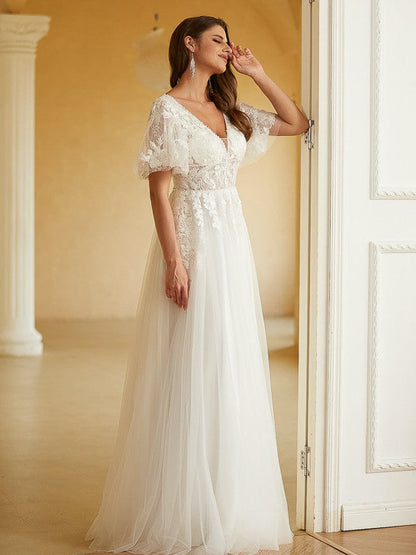 A-Line/Princess Tulle Applique Off-the-Shoulder Long Sleeves Chapel Train Wedding Dresses